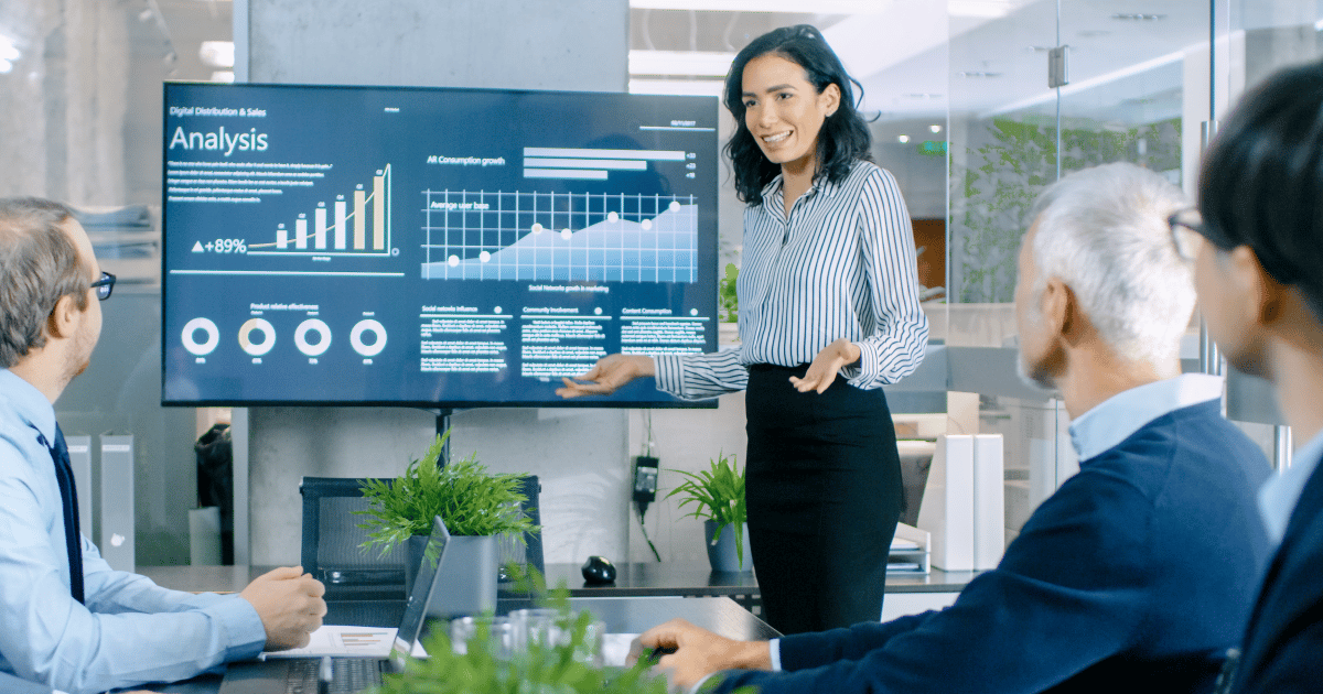 woman showing a graph in a business meeting