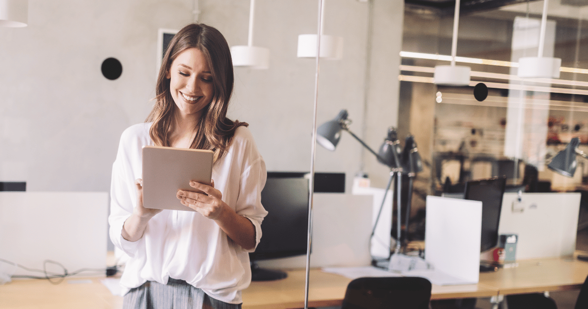 lady working in an office with a laptop