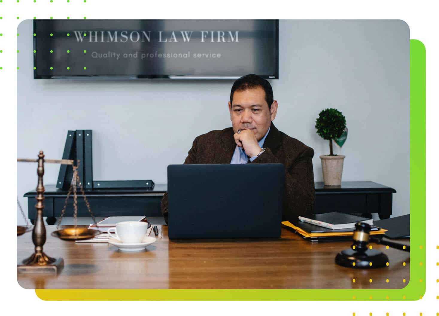 A lawyer staring at a laptop