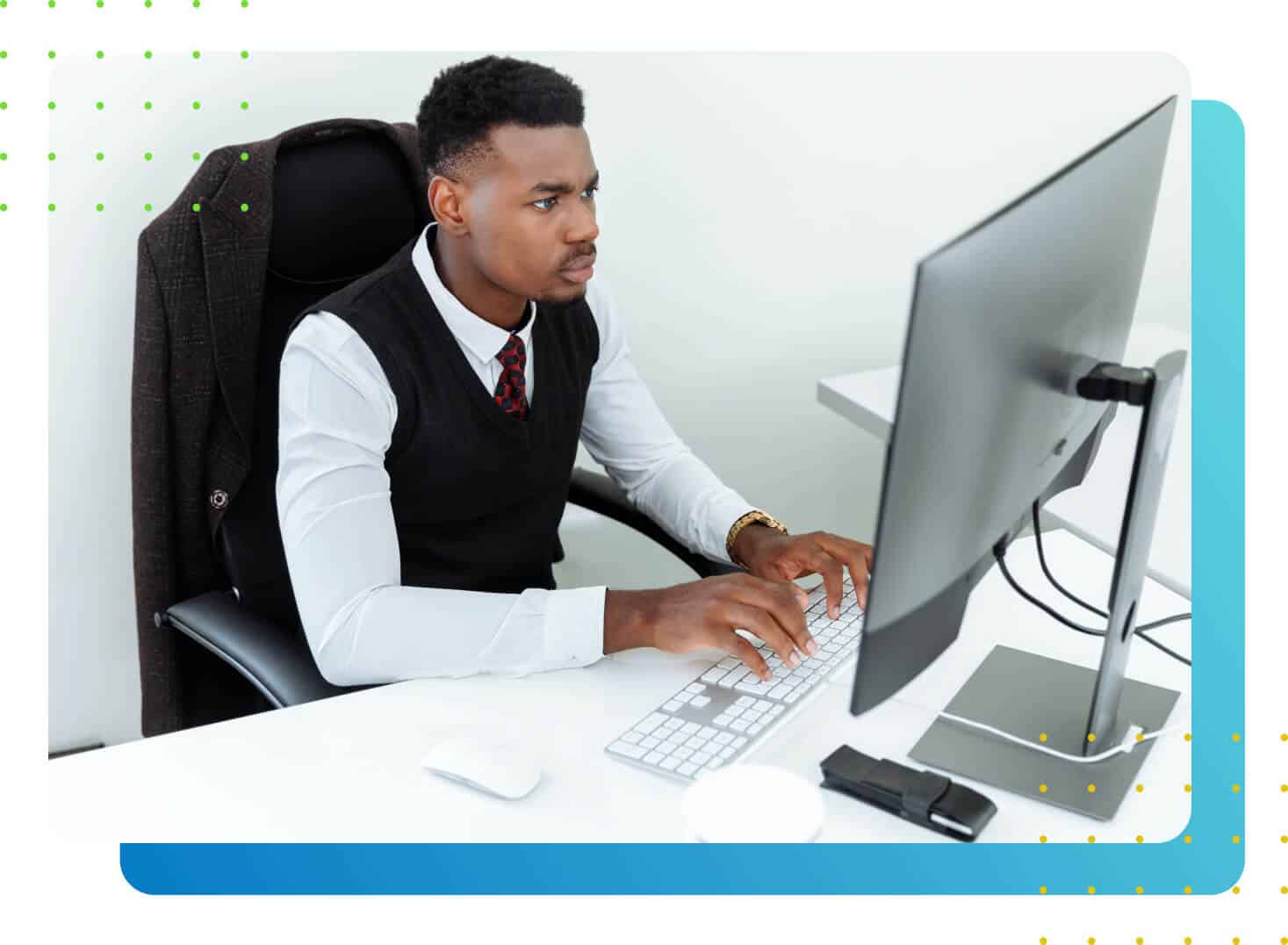 A man pressing a desktop keyboard