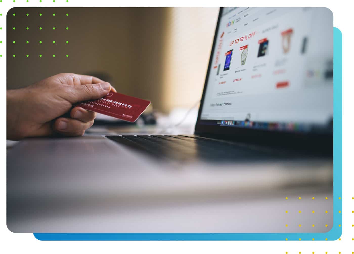 A person holding a payment card in front of a laptop - LeanLaw
