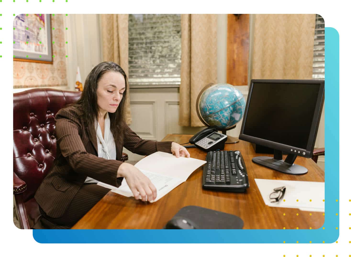 A woman turning the pages of a book