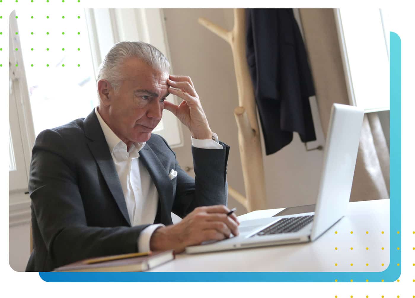 An elderly man in front of a laptop - LeanLaw